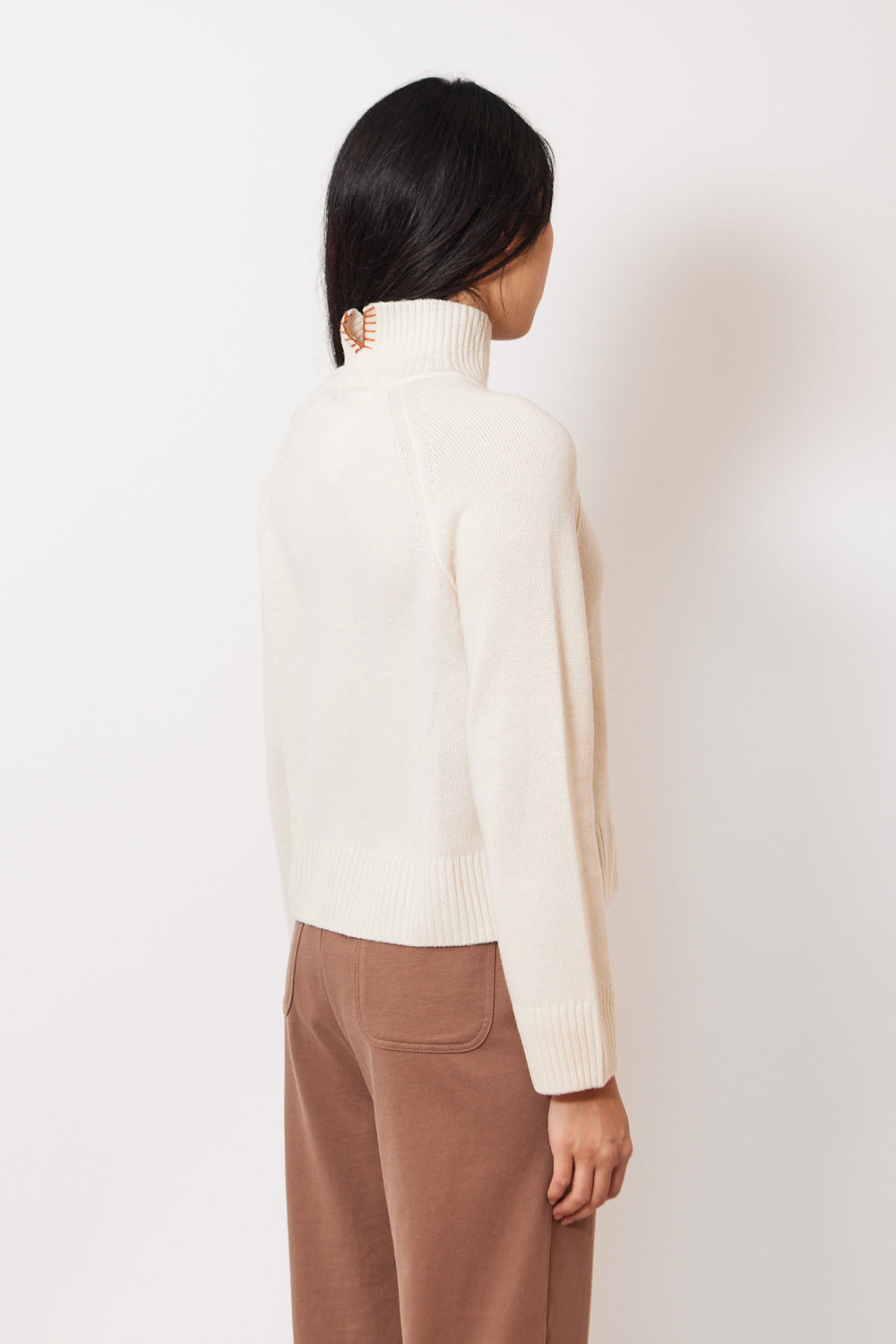 Madelyn wearing Lilla P Full Sleeve Turtleneck Sweater rear view