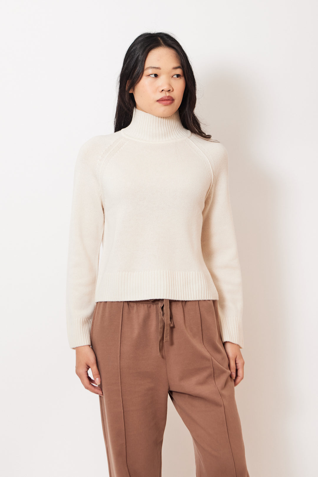 Madelyn wearing Lilla P Full Sleeve Turtleneck Sweater front view