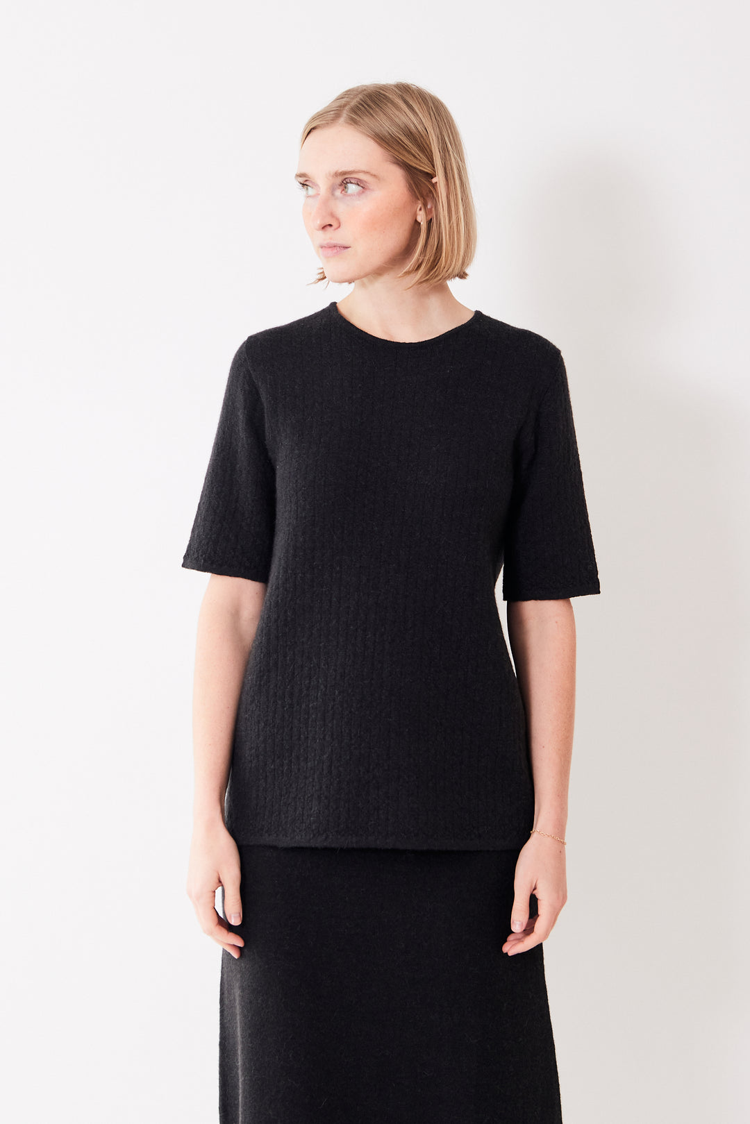 Madi wearing Lauren Manoogian Line Quilt Tee front view