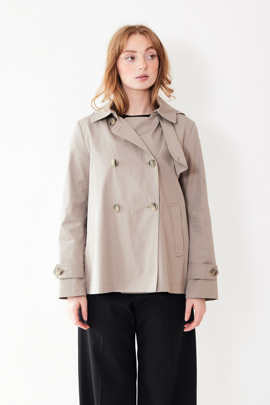 Waverly wearing Herno Cotton Short Trench With Hood And Bell Sleeves front view