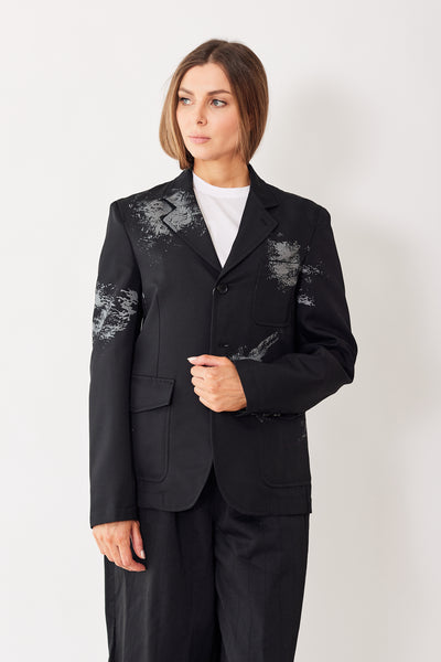 Mari wearing Comme des Garçons Mens Woven Grey Painted Jacket front view