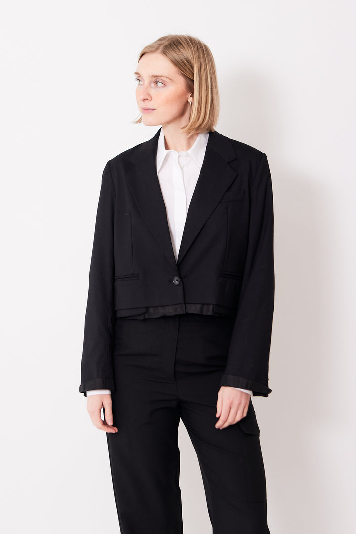 Madi wearing WE-AR4 The Cocktail Blazer front view