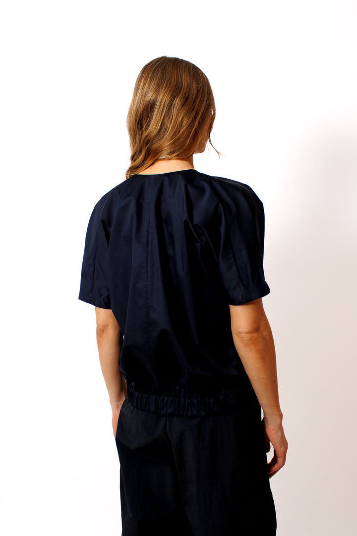 Mari wearing Zero + Maria Cornejo Rae Cotton Broadcloth Bomber Top rear view