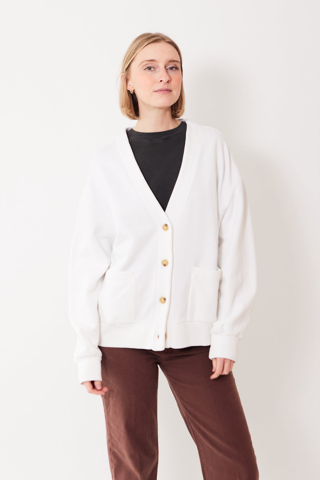 Madi wearing Xirena Benny Cardigan front view