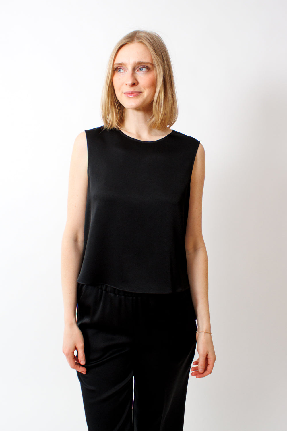 Madi wearing Rosso 35 Sleeveless Tank front view