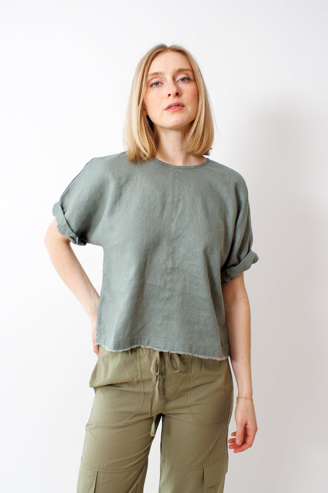 Madi wearing Xirena Savoye Top front view 