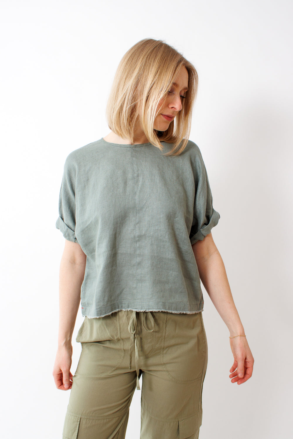 Madi wearing Xirena Savoye Top front view 