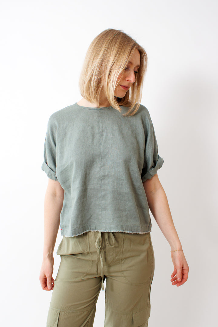Madi wearing Xirena Savoye Top front view 