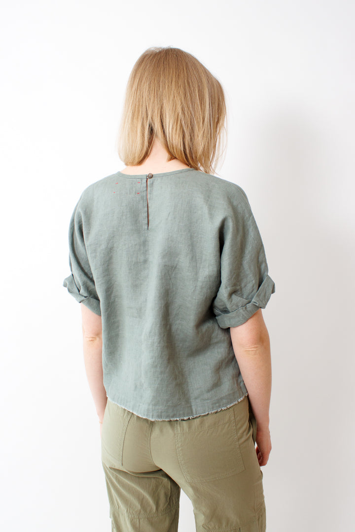 Madi wearing Xirena Savoye Top rear view 