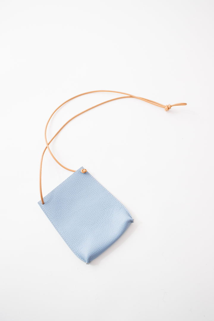 Flat lay of B. May Cell Pouch front view