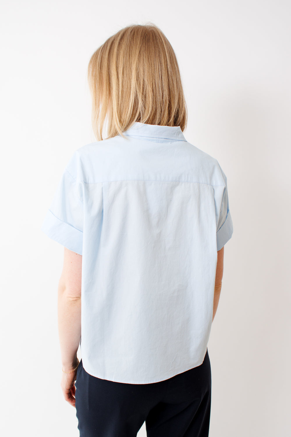 Madi wearing Jamie Haller The Camp Shirt Baby Blue rear view
