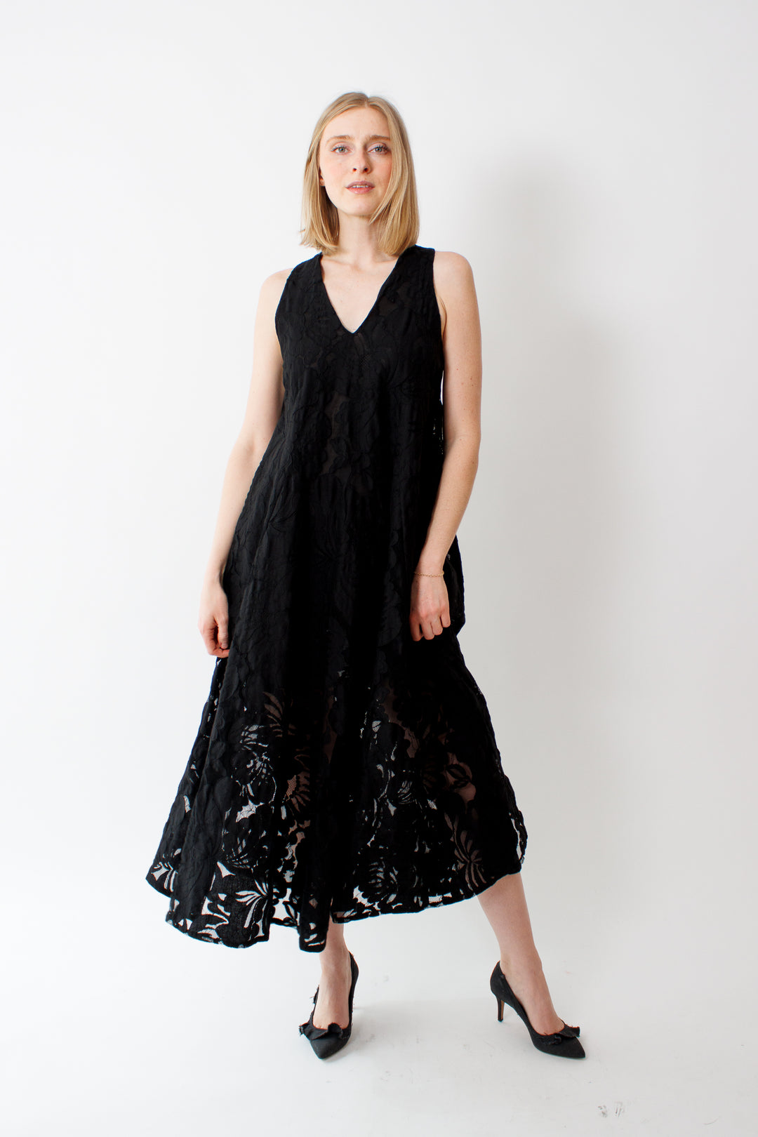 Madi wearing Meimeij Sleeveless Sheer Mesh Floral Lace Dress front view