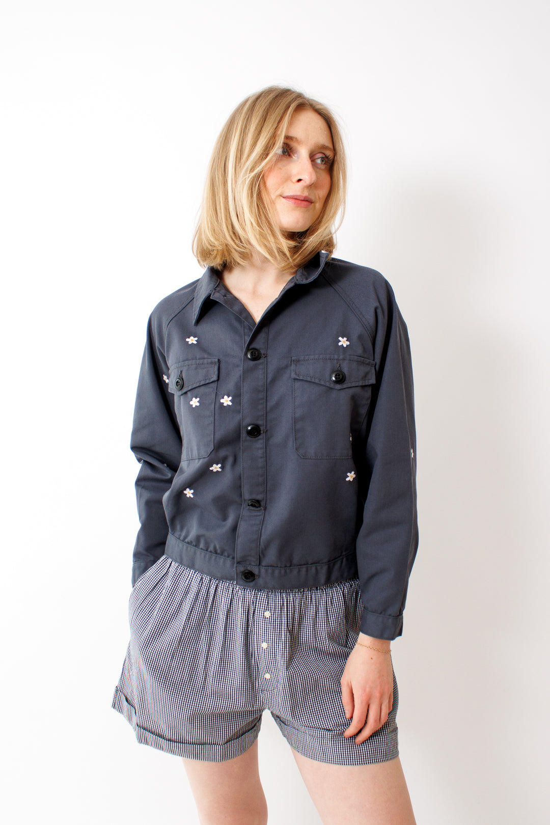 Madi wearing The Great The Garage Jacket With Daisy Embroidery front view
