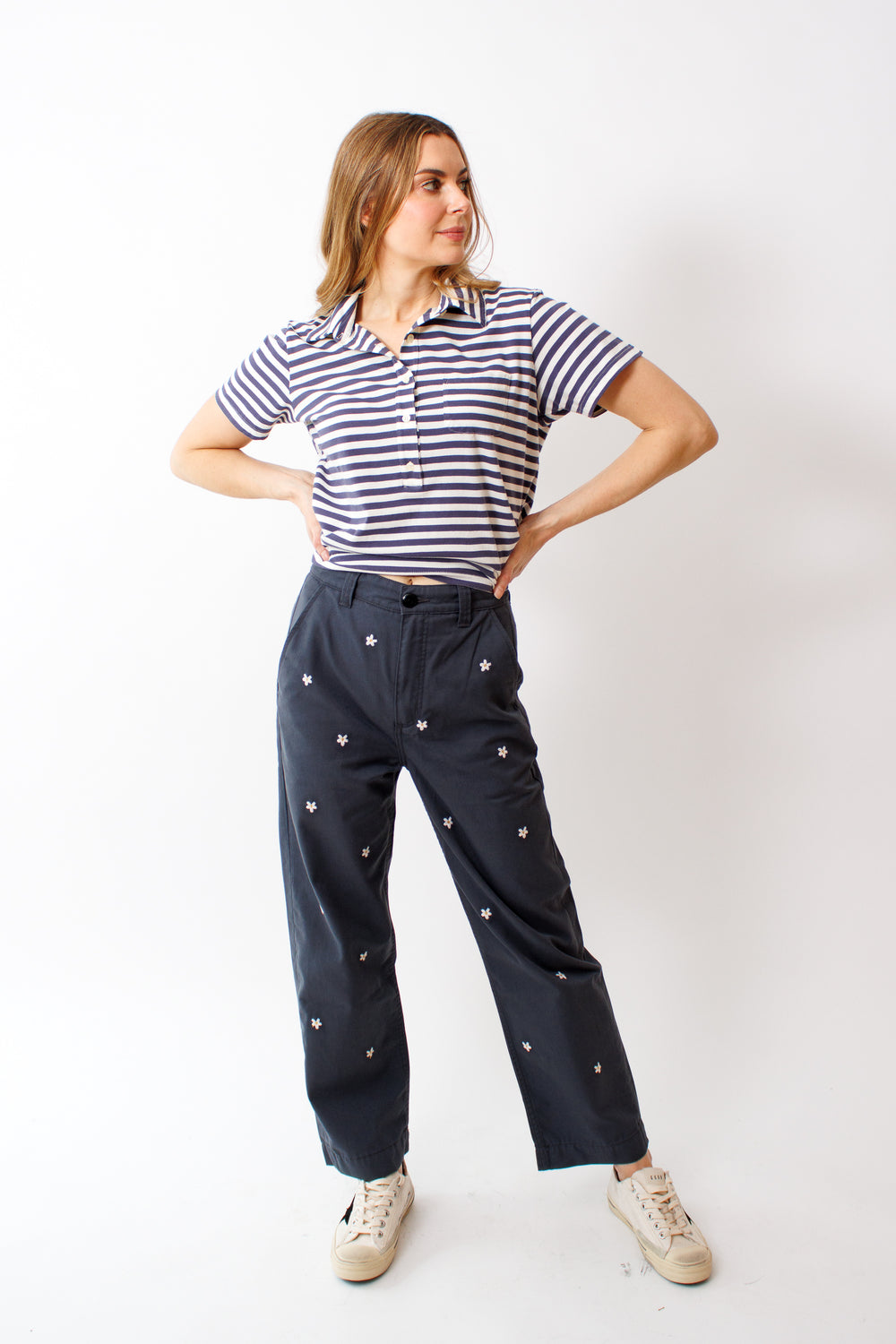 Mari wearing The Great The Garage Pant With Daisy Embroidery rear view