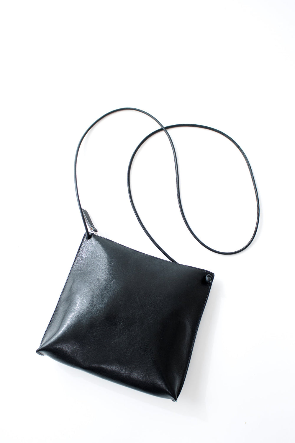 Mari wearing B. May Strappy Pouch rear view