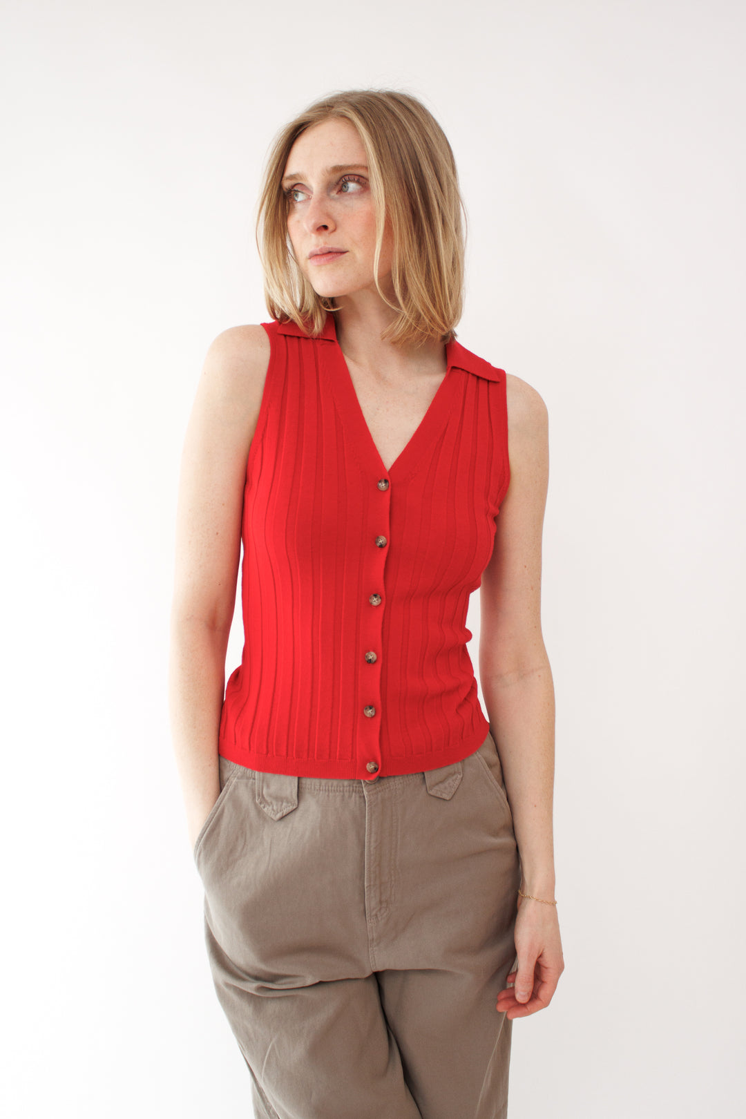 Madi wearing Allude Lightweight Virgin Wool Wide Rib Collar Vest front view 