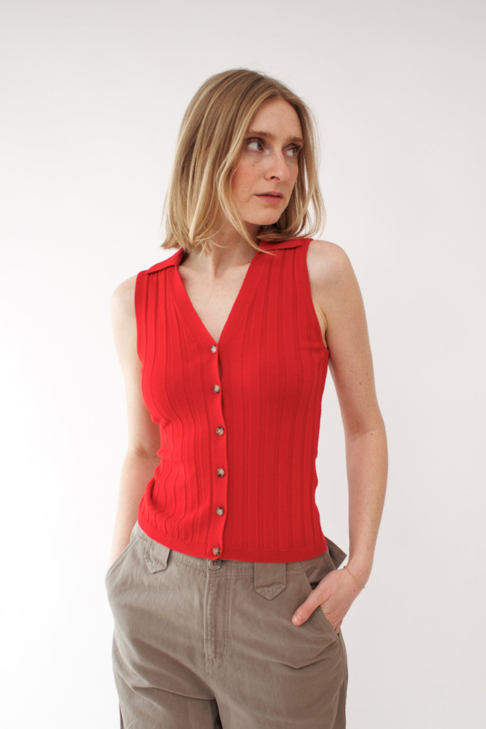 Madi wearing Allude Lightweight Virgin Wool Wide Rib Collar Vest front view 