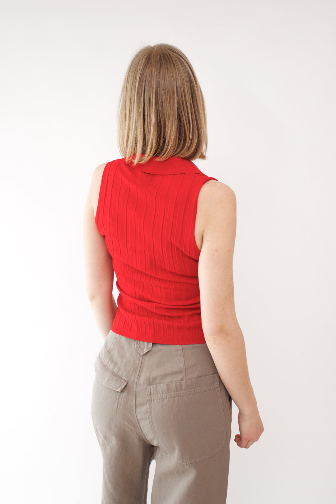Madi wearing Allude Lightweight Virgin Wool Wide Rib Collar Vest front view 