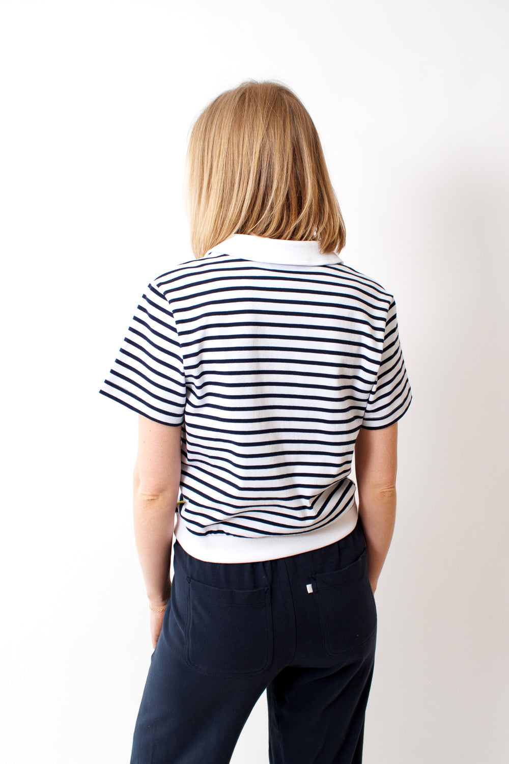 Madi wearing Lilla P Polo Popover Top rear view