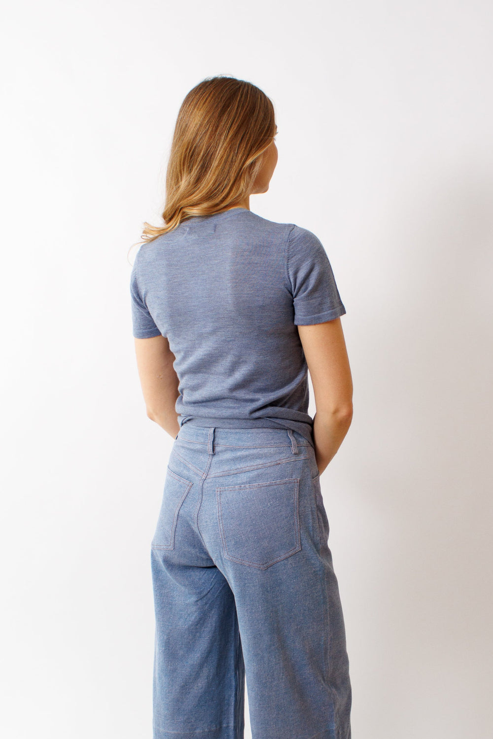 Mari wearing SPRWMN Relaxed T Shirt rear view