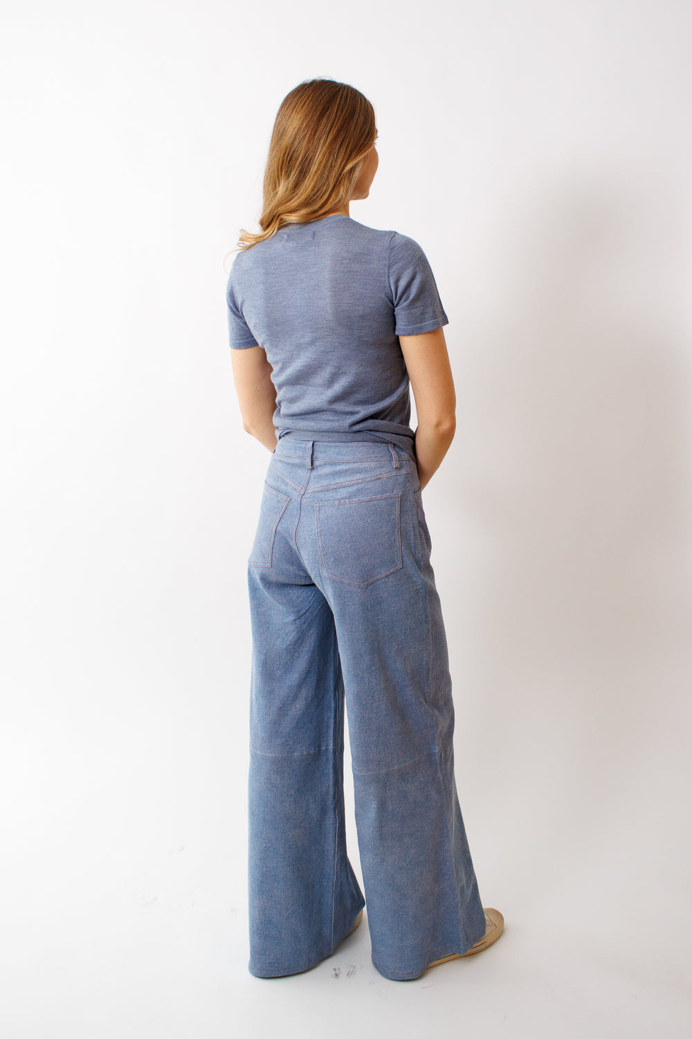 Mari wearing SPRWMN 5 Pocket Mid Rise Wide Leg rear view 