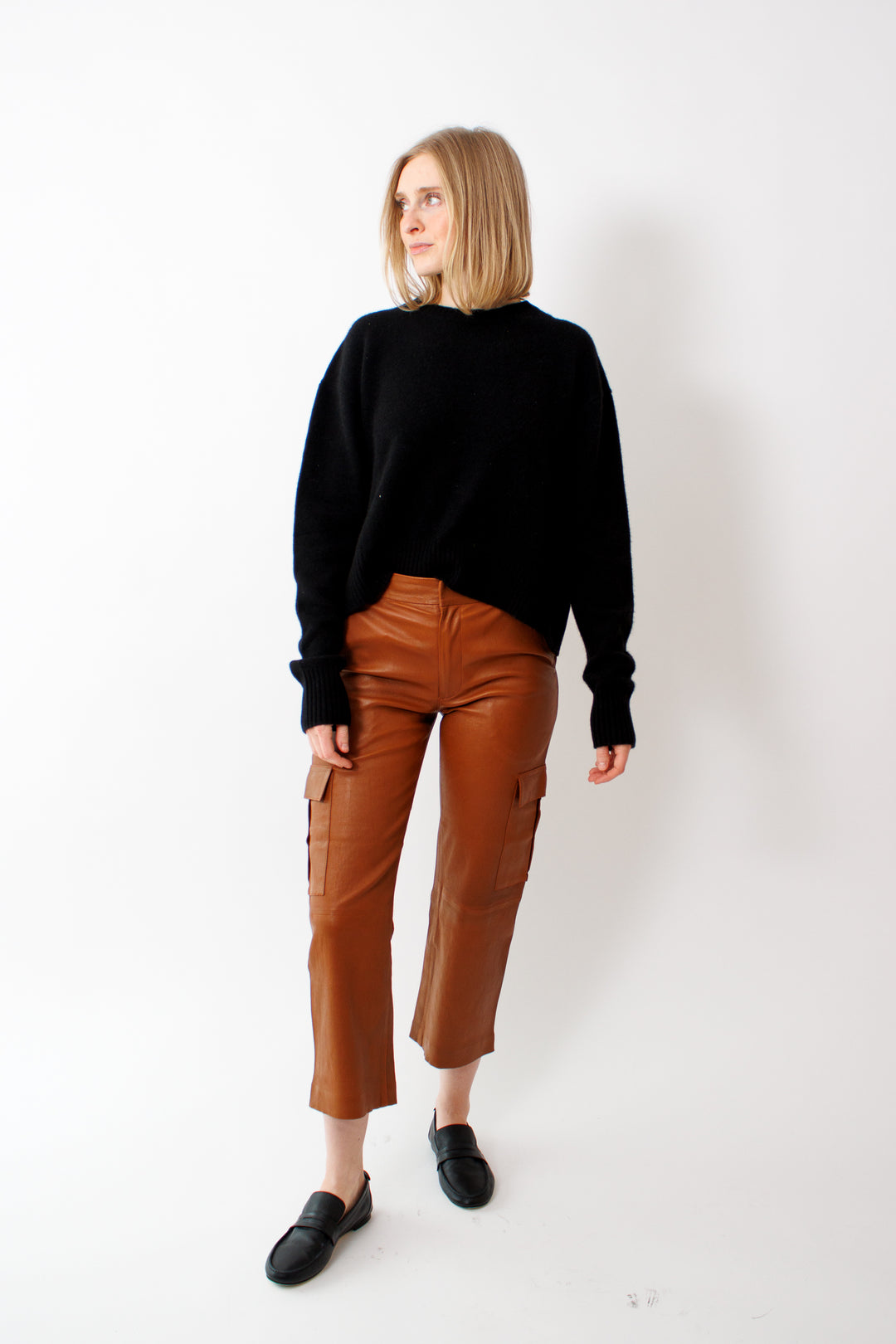 Madi wearing SPRWMN Cropped Baggy Lowrise Cargo Pants front view