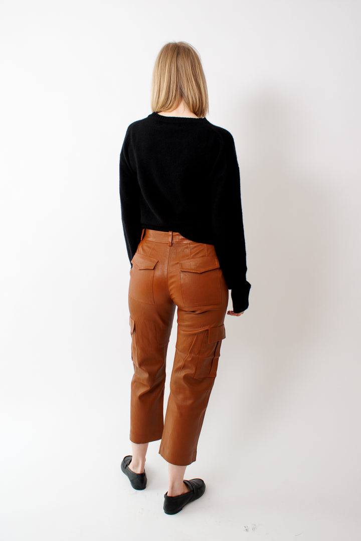 Madi wearing SPRWMN Cropped Baggy Lowrise Cargo Pants rear view