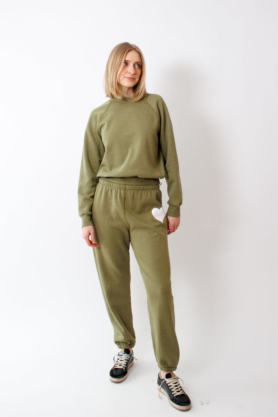 Madi wearing Heart Sweatpant Basil front view 