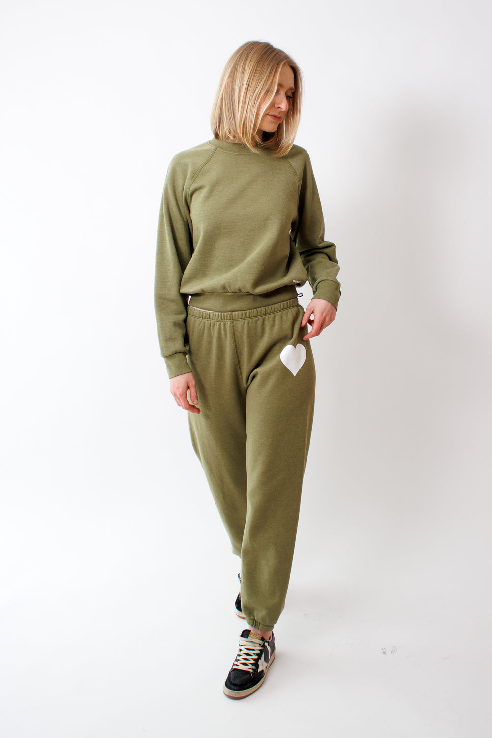 Madi wearing Heart Sweatpant Basil front view 