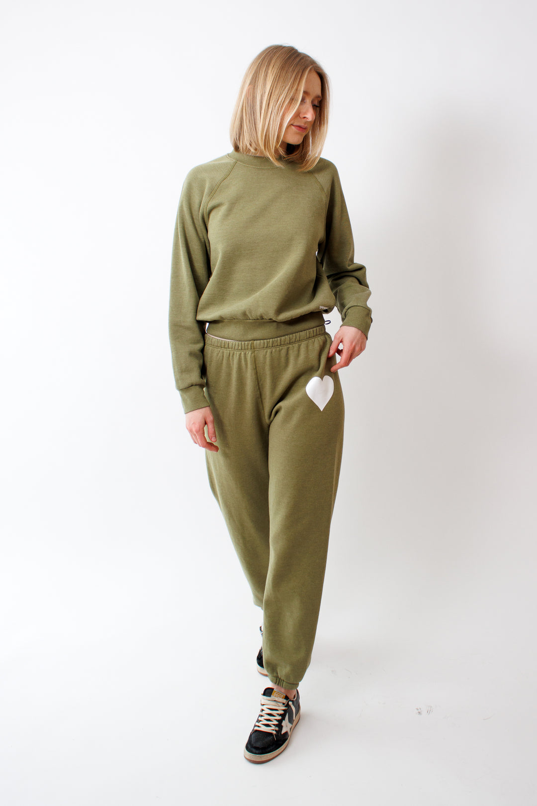 Madi wearing Heart Sweatpant Basil front view 