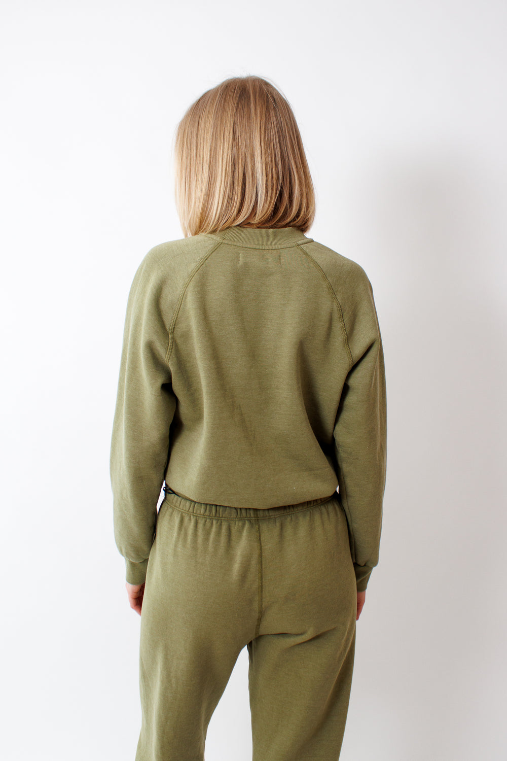 Madi wearing SPRWMN Shrunken Raglan Sweatshirt rear view 