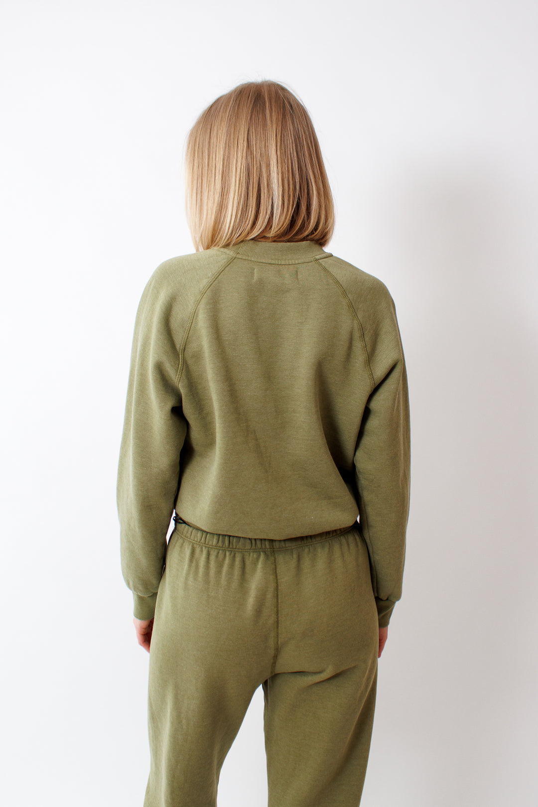 Madi wearing SPRWMN Shrunken Raglan Sweatshirt rear view 