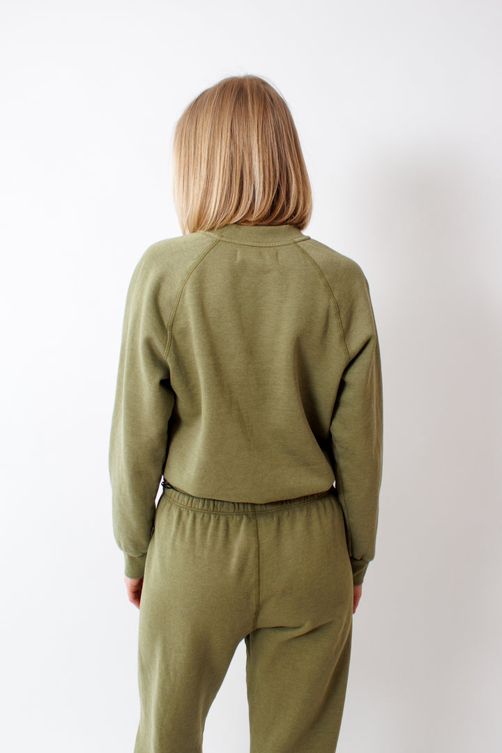 Madi wearing SPRWMN Shrunken Raglan Sweatshirt rear view 