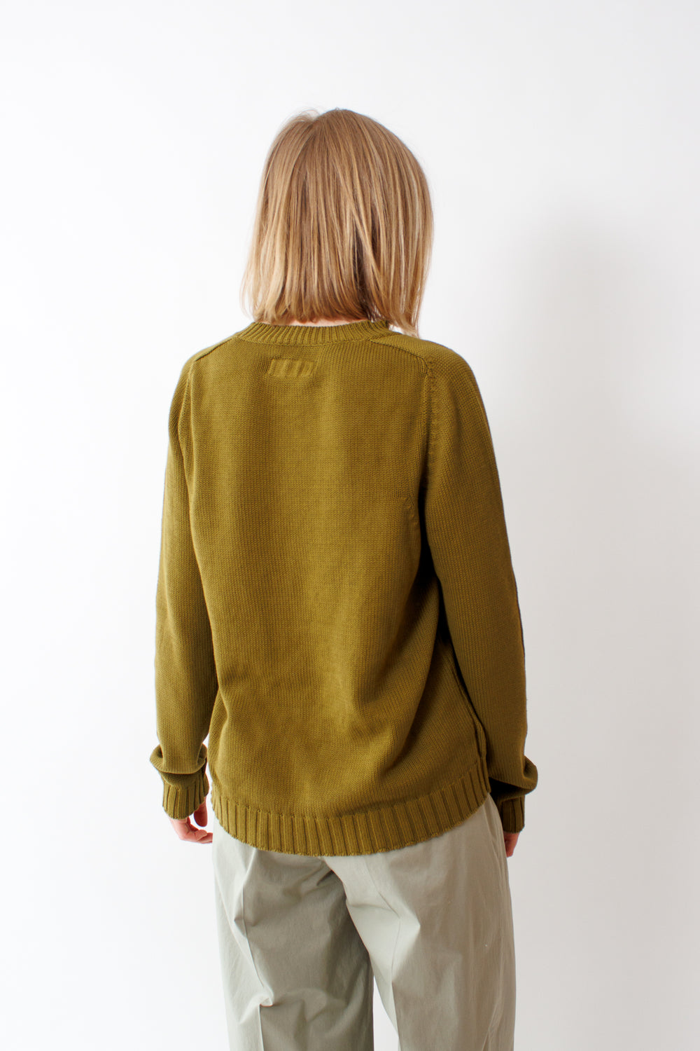 Madi wearing Labo.Art Train Sweater rear view 