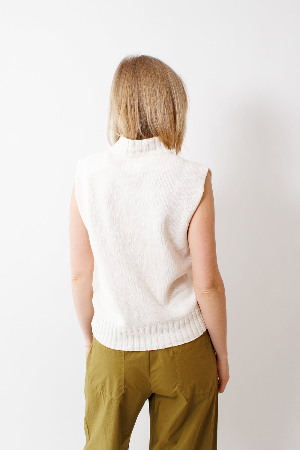 Madi wearing Labo.Art Flavian Vest rear view
