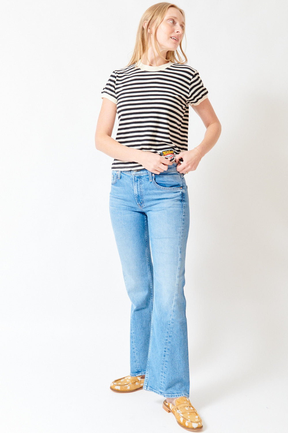 Madi wearing Mother Denim The Bookie Twist Skimp front view