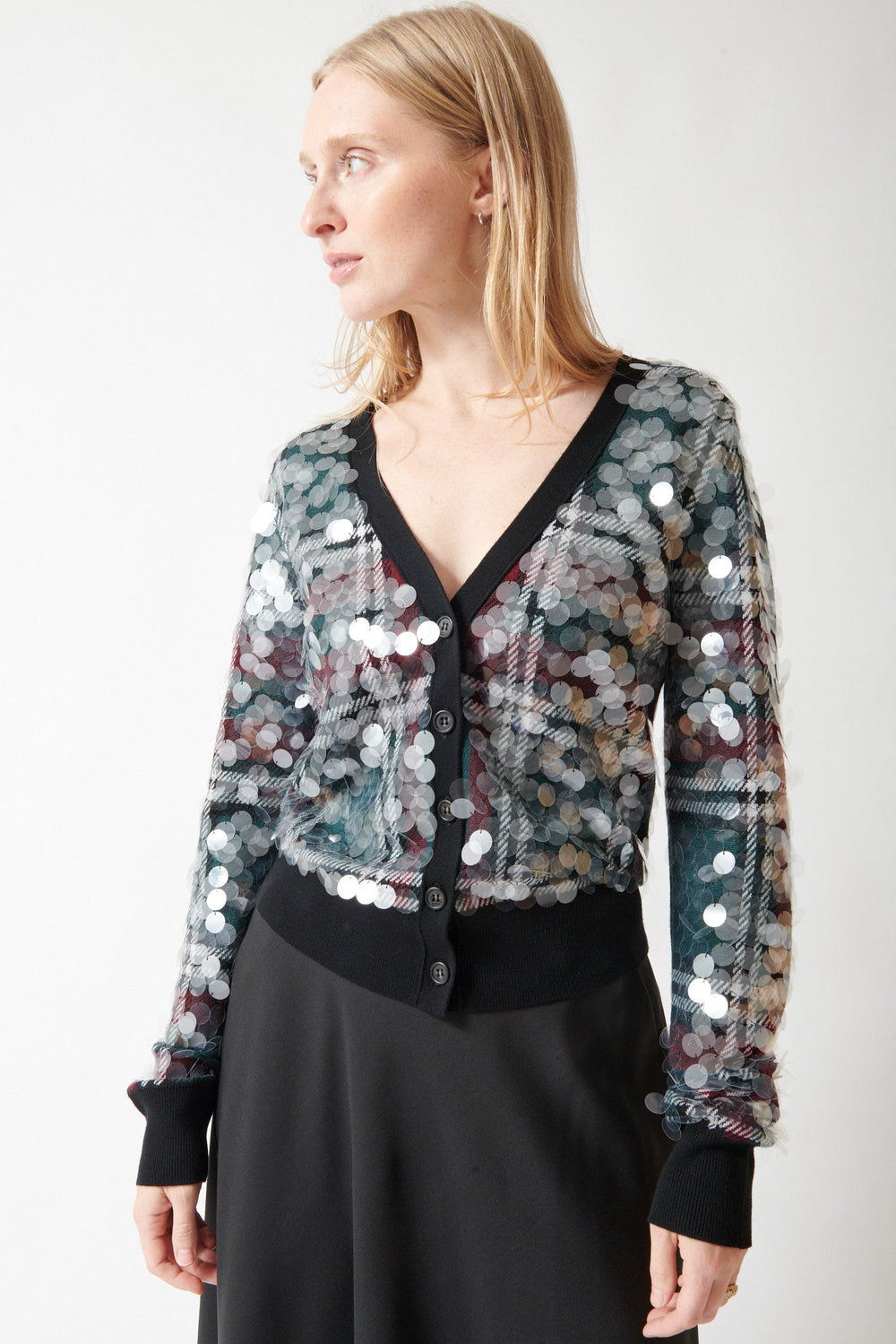 Madi wearing N°21 Stuck On You Paillettes Cardigan Party front view