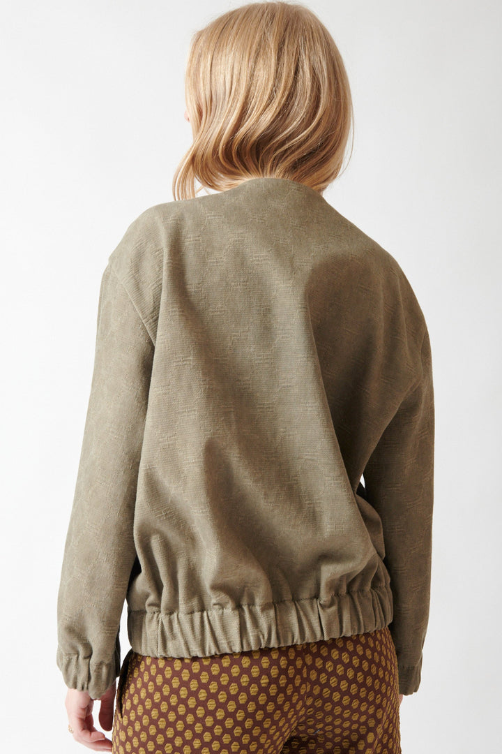 Madi wearing Odeeh Cotton Damask Bejeweled Zip Jacket rear view