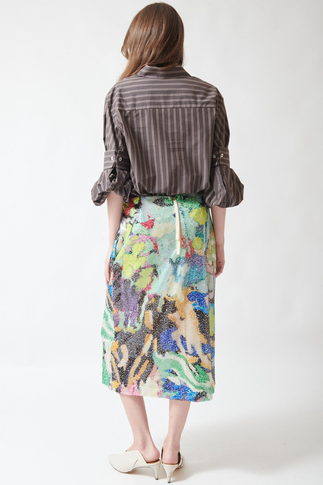 Angela wearing Odeeh Sequin Floral Skirt rear view
