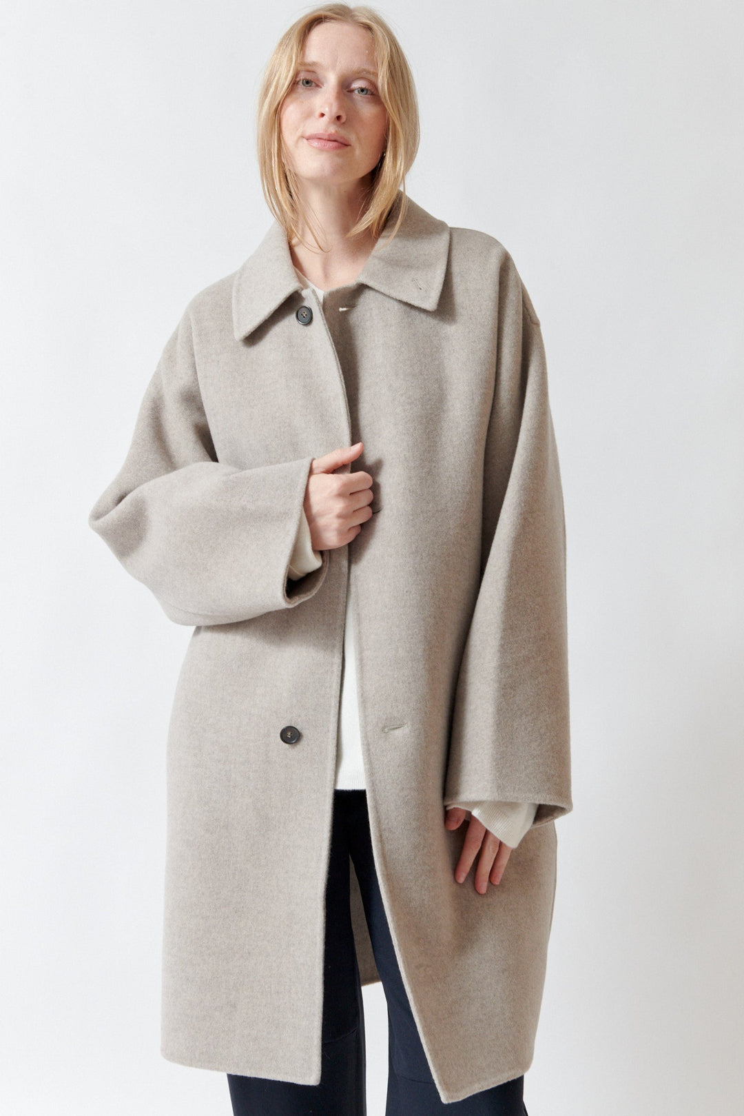 Madi wearing Sofie D'Hoore Carmine Long Jacket front view