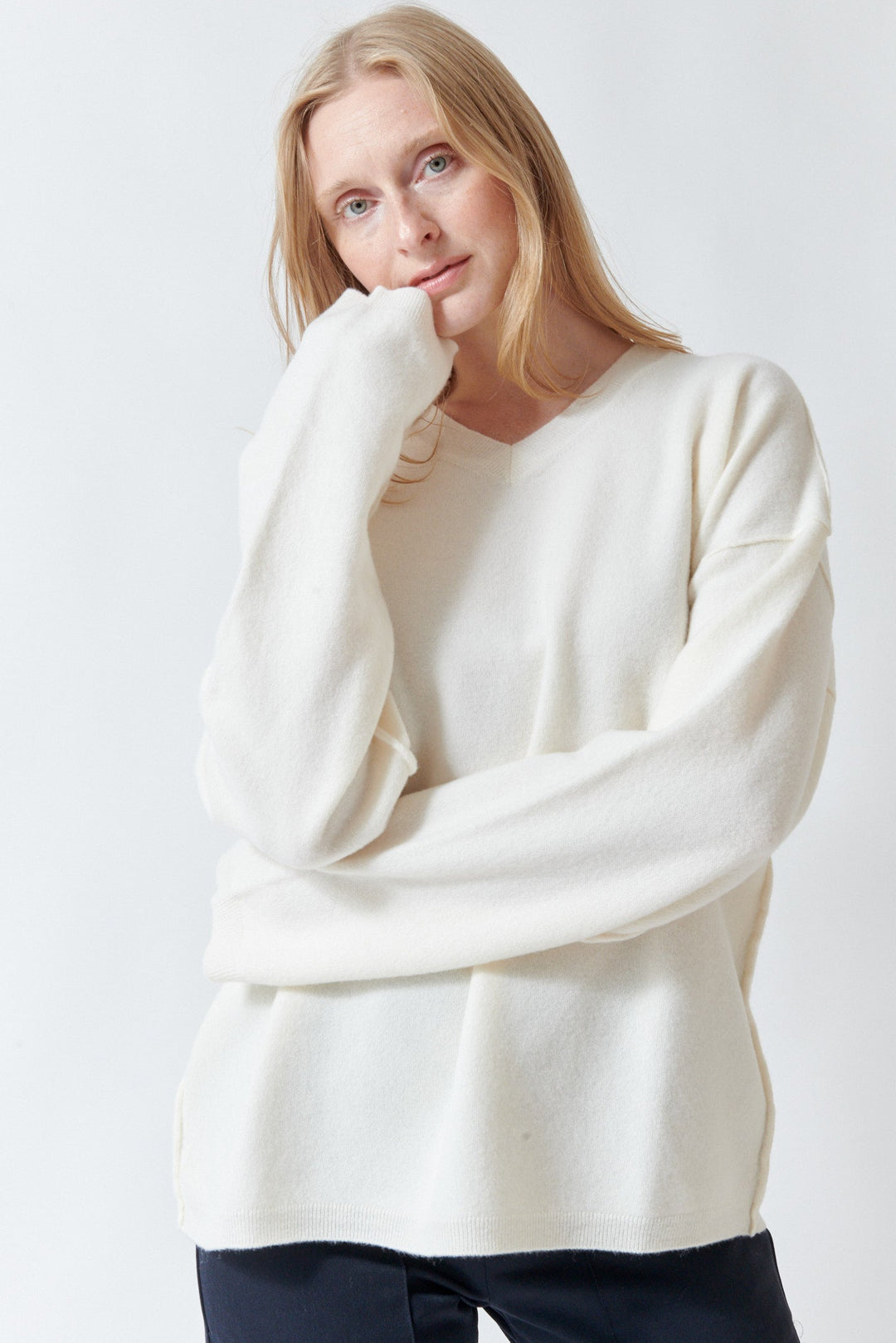 Madi wearing Sofie D'Hoore Maurice Long Sleeve V Neck Pullover front view
