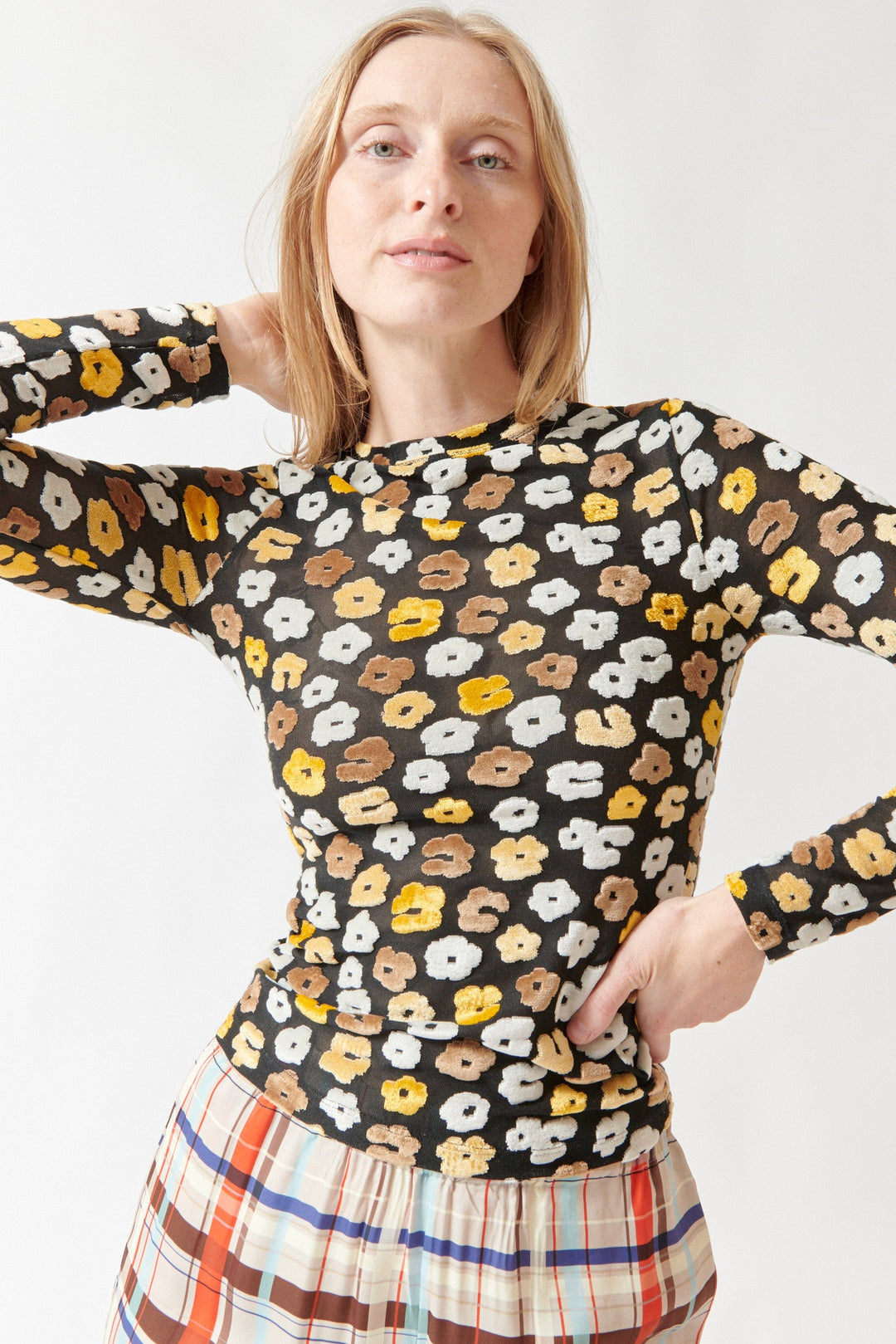 Madi wearing Stine Goya Velvet Devore Long Sleeve Elasticated Top Petal Polka front view