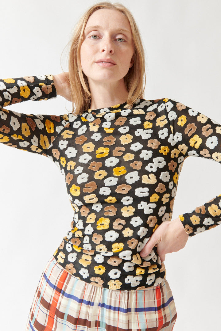 Madi wearing Stine Goya Velvet Devore Long Sleeve Elasticated Top Petal Polka front view