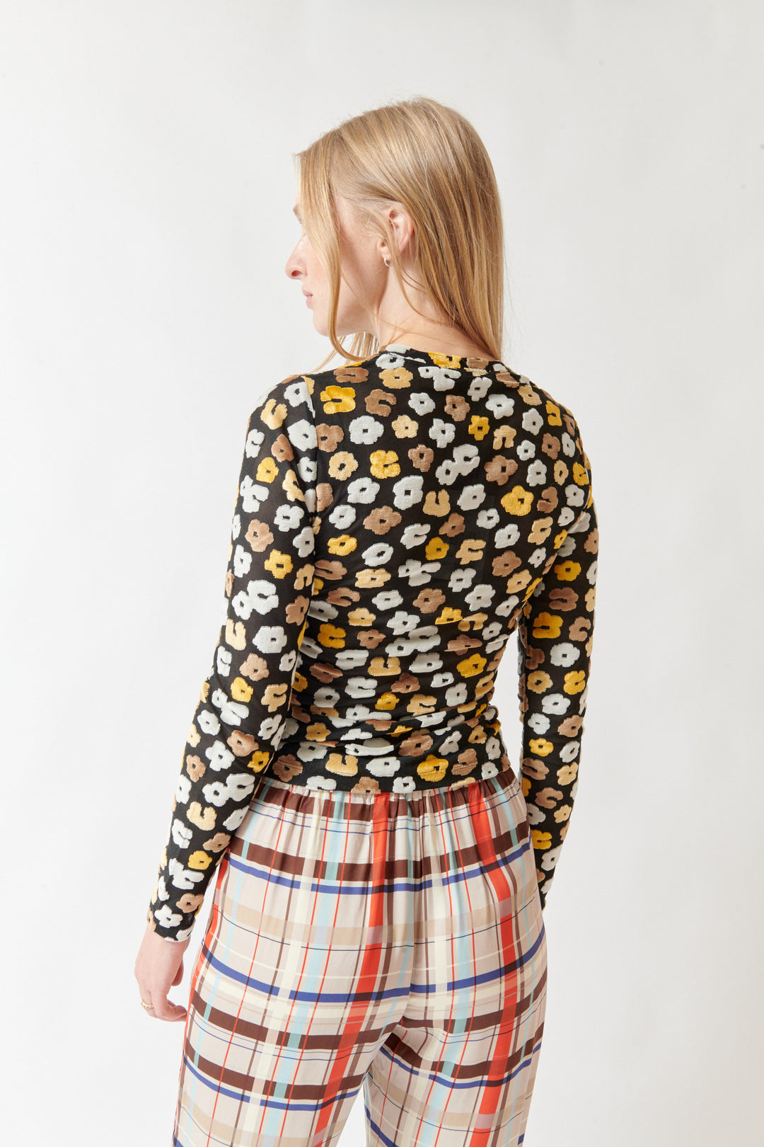 Madi wearing Stine Goya Velvet Devore Long Sleeve Elasticated Top Petal Polka rear view