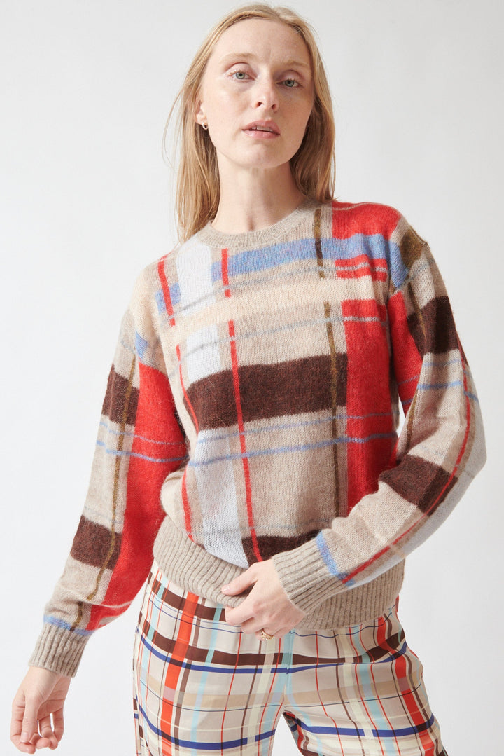 Madi wearing Stine Goya Wool Alpaca Long Sleeve Crewneck Knit Pullover Scarlet Grid front view