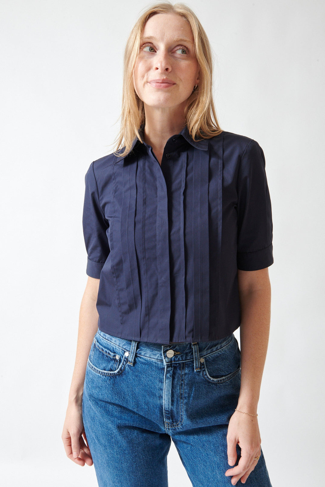 Madi wearing TWP Short Lived Placket Shirt With Cherry Pleats front view