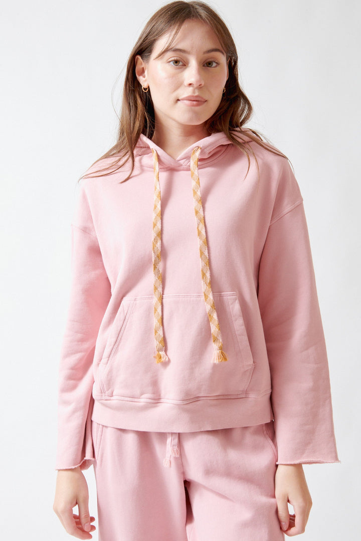 Angela wearing Xirena Chase Sweatshirt Pink Dust front view