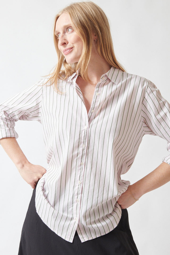 Madi wearing Xirena Beau Shirt in Matcha Pink Stripe front view