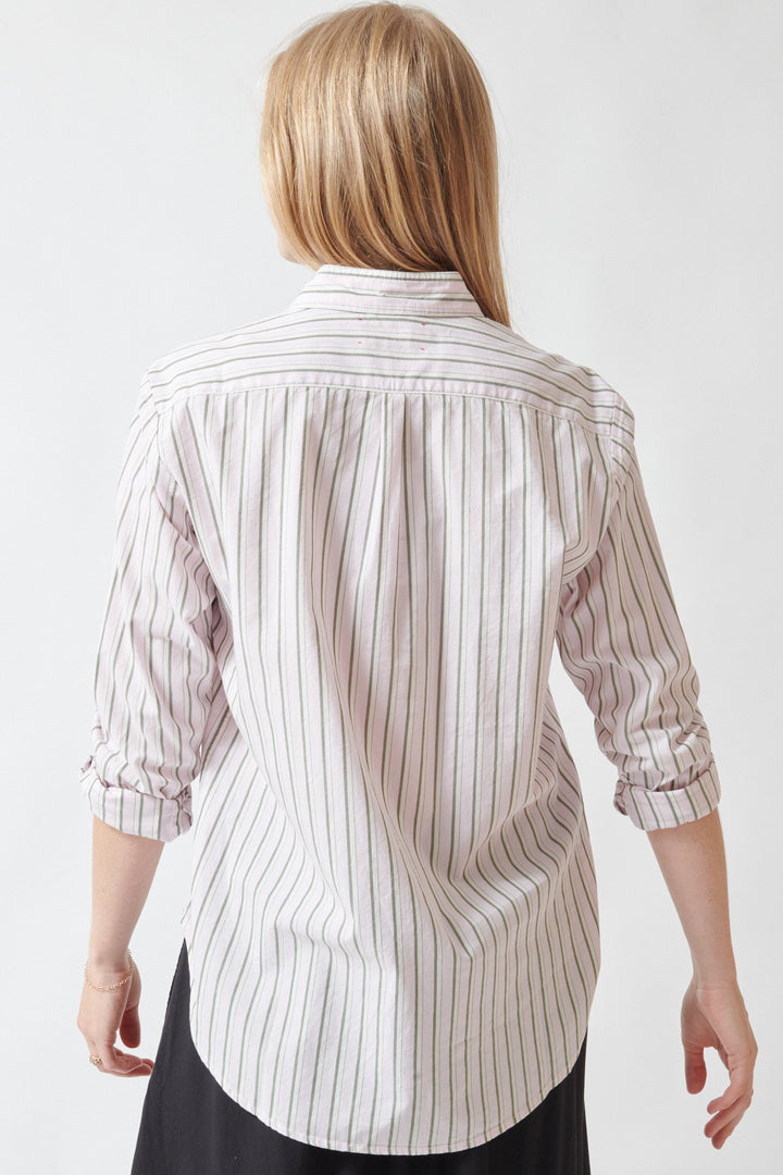 Madi wearing Xirena Beau Shirt in Matcha Pink Stripe rear view