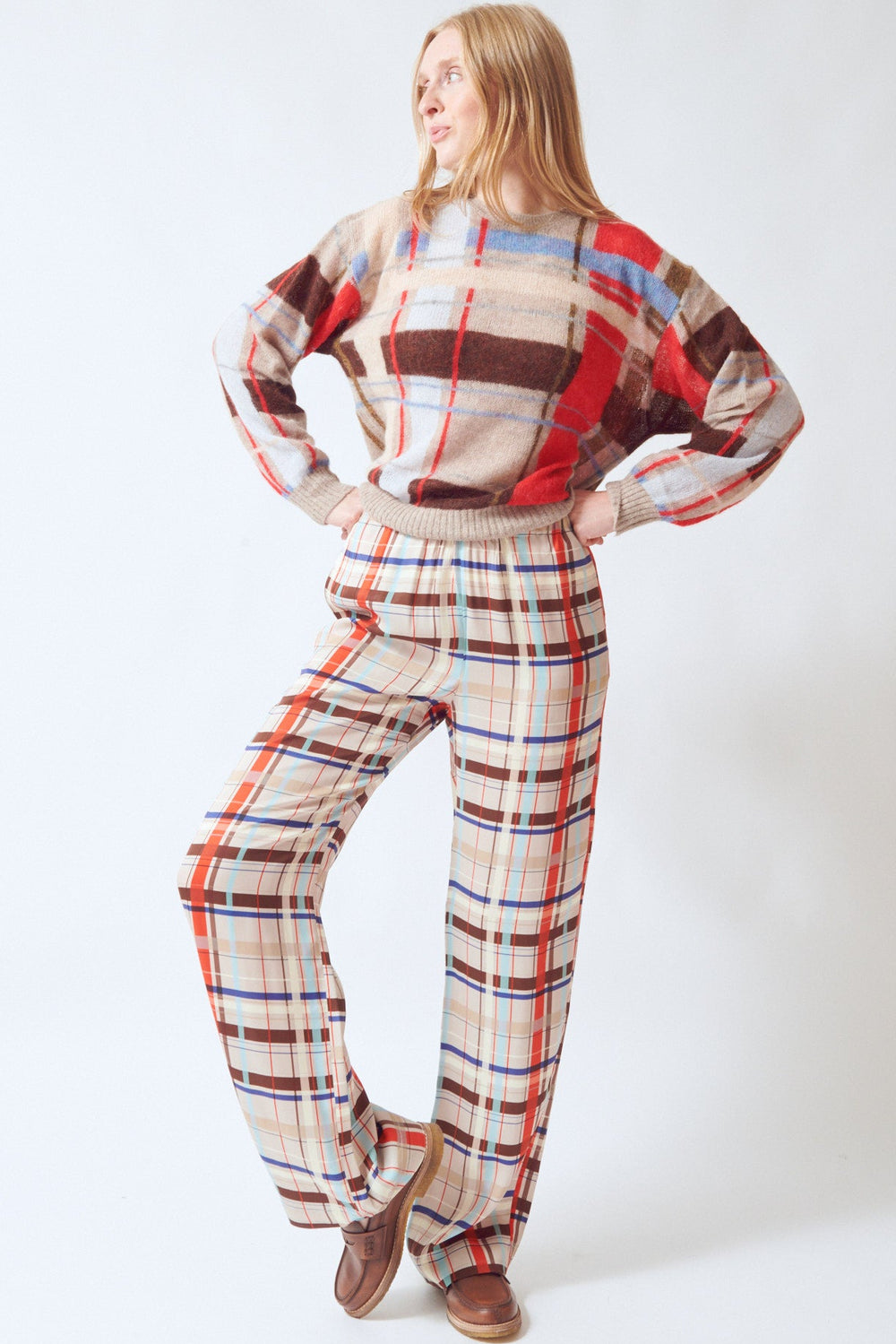 Madi wearing Stine Goya Dry Viscose Elasticated Long Pants Scarlet Grid front view